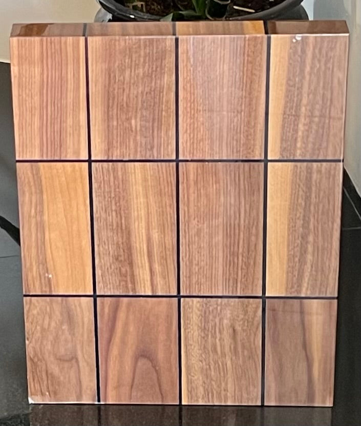PALM ANGLES - L-Shaped Counter Top Branded Display. Lacquered Wood & White Tile