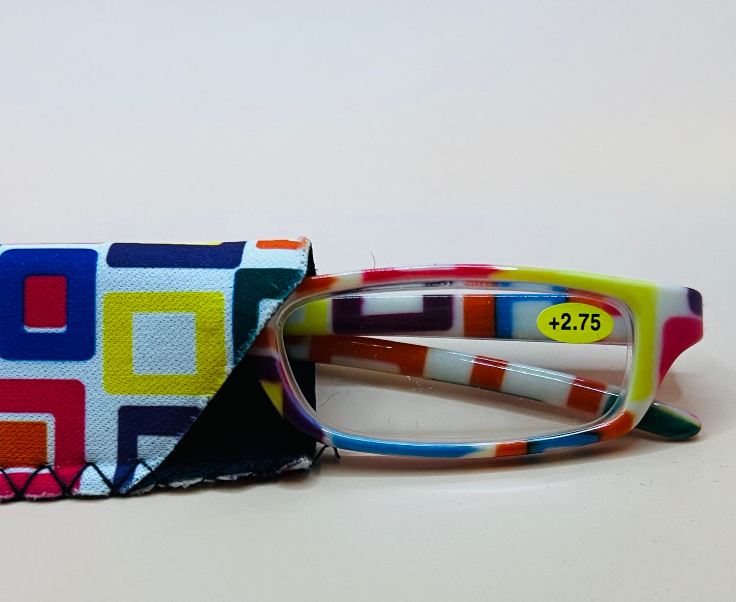 BRAND NEW GEOMETRIC NARROW READERS. FEATURES MULTI-COLOR DESIGN WITH MATCHING CASE
