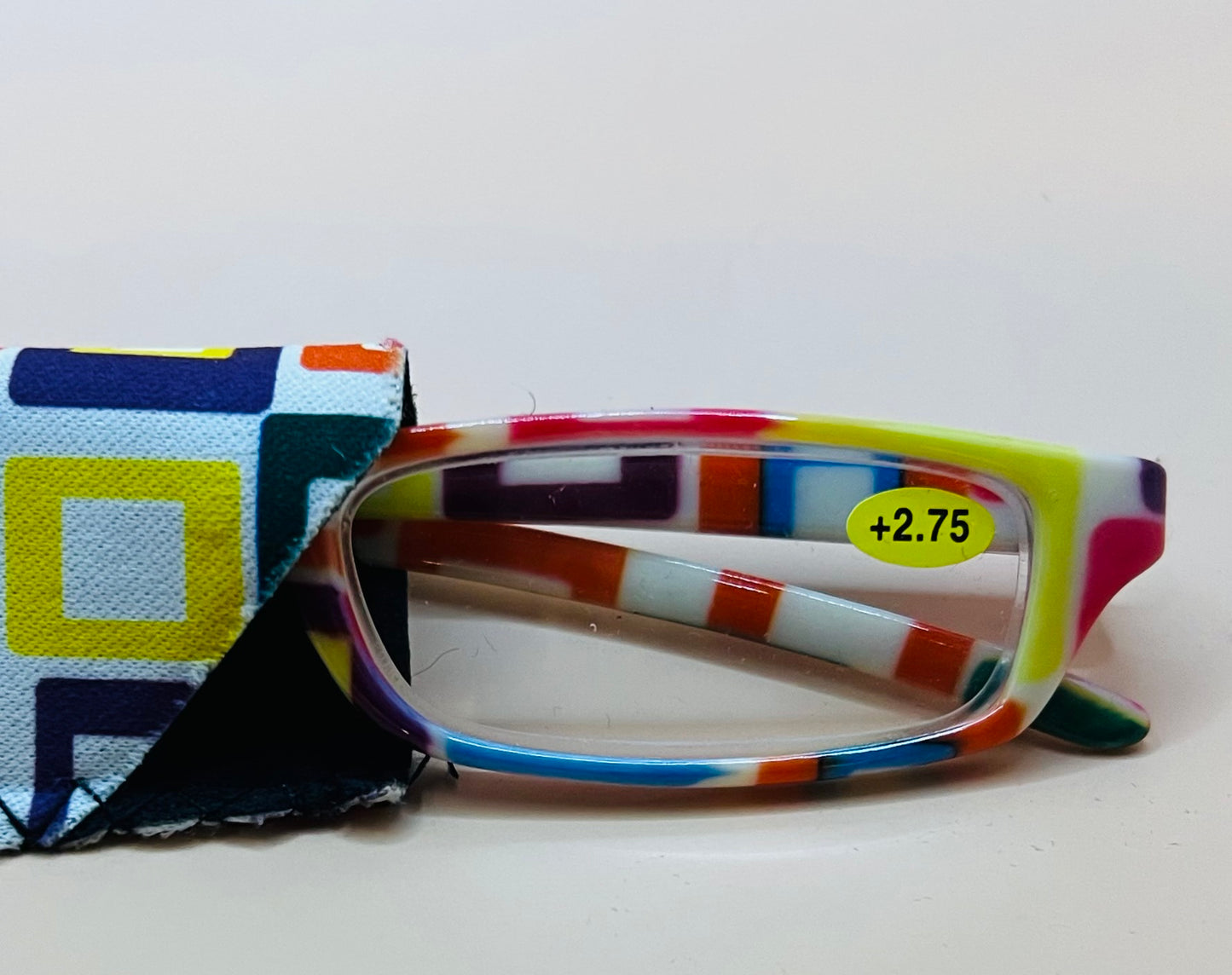 BRAND NEW GEOMETRIC NARROW READERS. FEATURES MULTI-COLOR DESIGN WITH MATCHING CASE