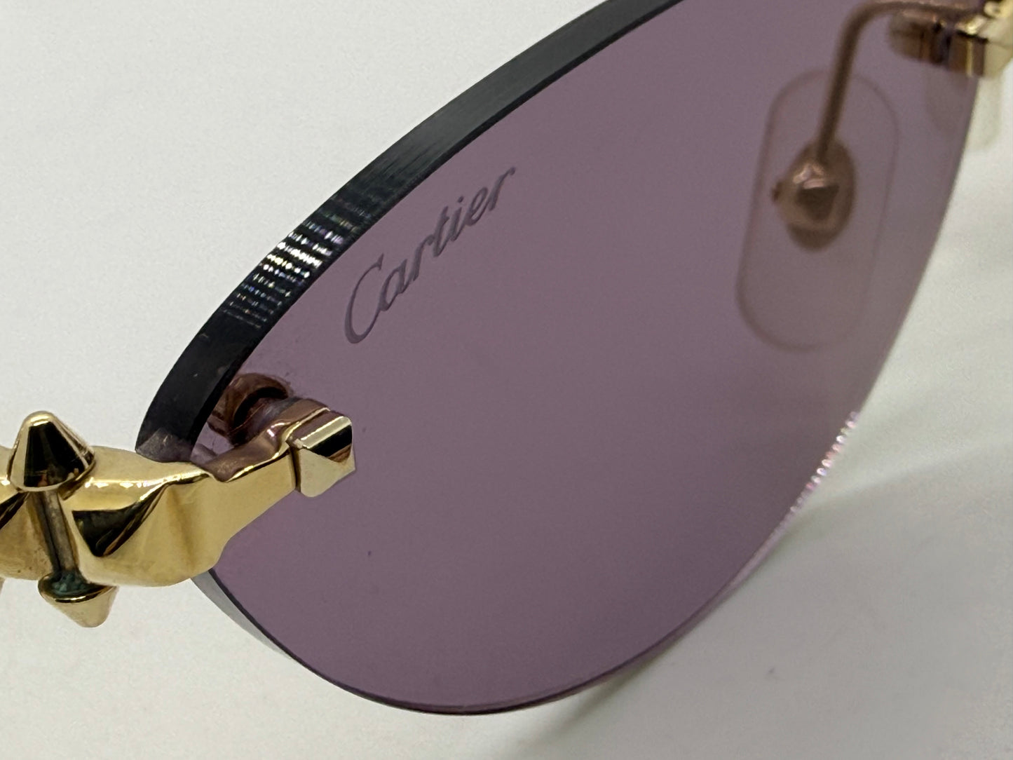 Cartier Clash de Cartier CT0543S 004 Gold Rimless Sunglasses-ZEISS Purple Lenses