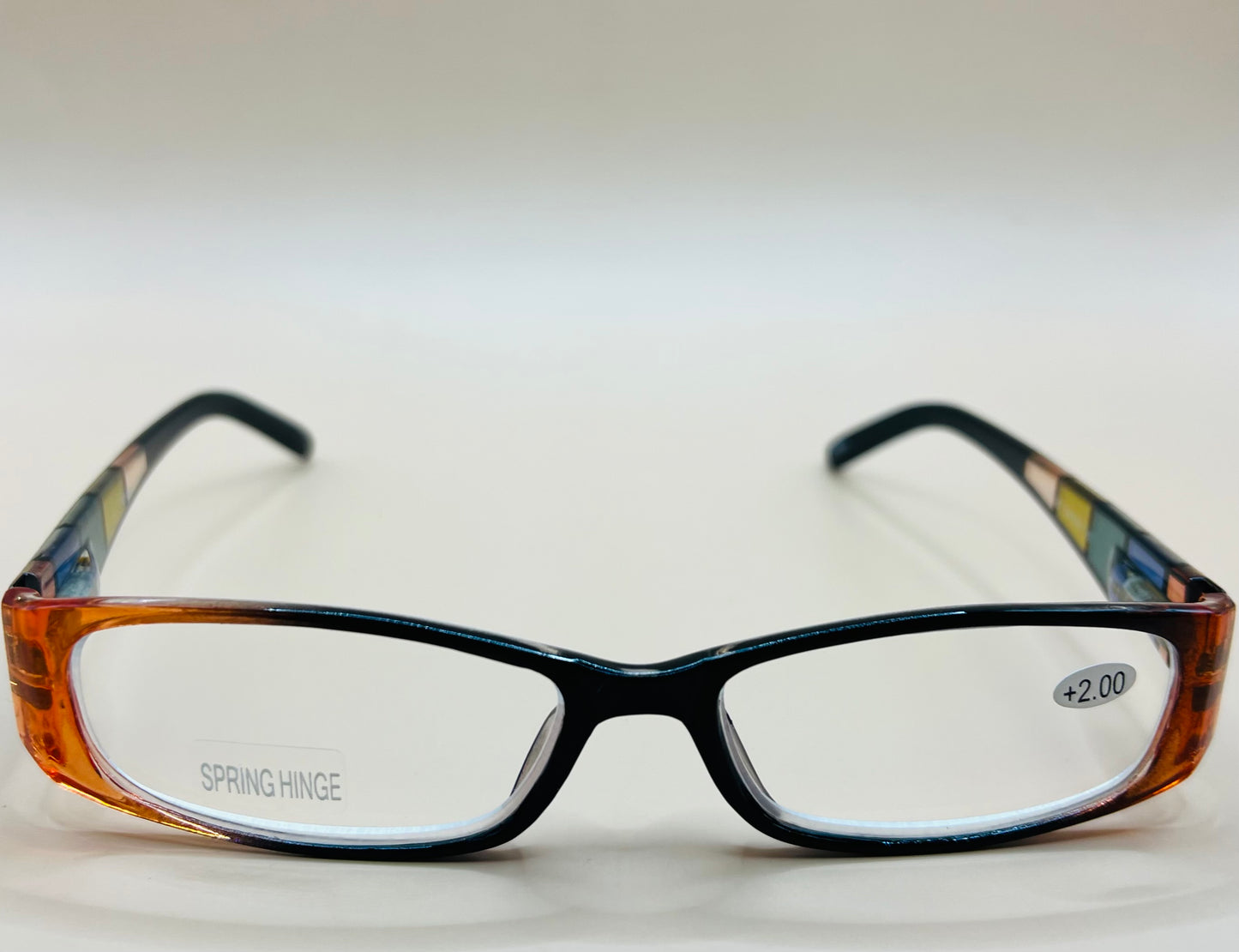 GEOMETRIC NARROW READERS.  BLACK FRAME FRONT WITH MULTI-COLOR ARMS