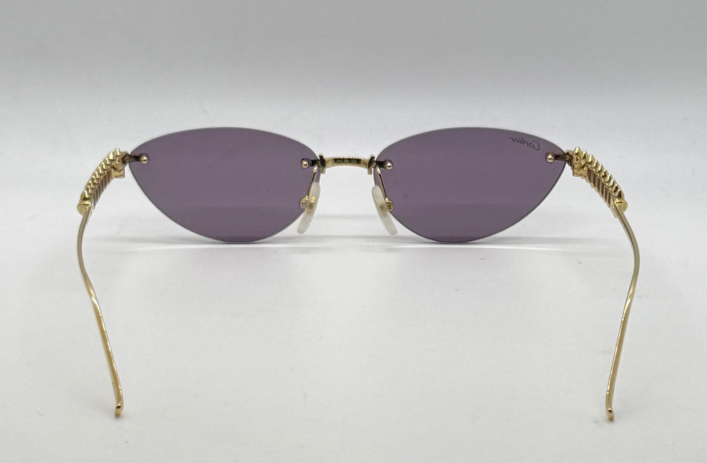 Cartier Clash de Cartier CT0543S 004 Gold Rimless Sunglasses-ZEISS Purple Lenses