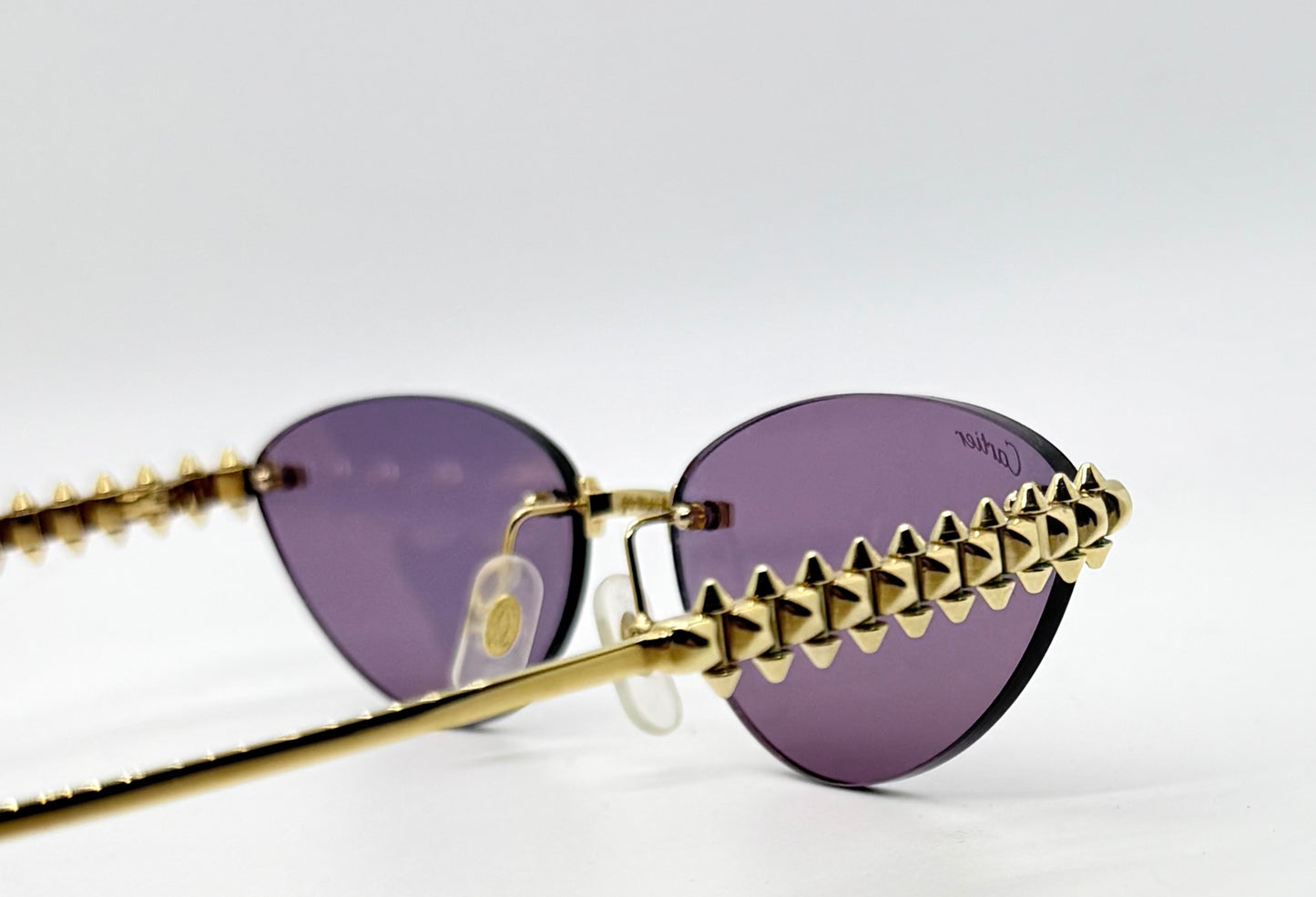 Cartier Clash de Cartier CT0543S 004 Gold Rimless Sunglasses-ZEISS Purple Lenses