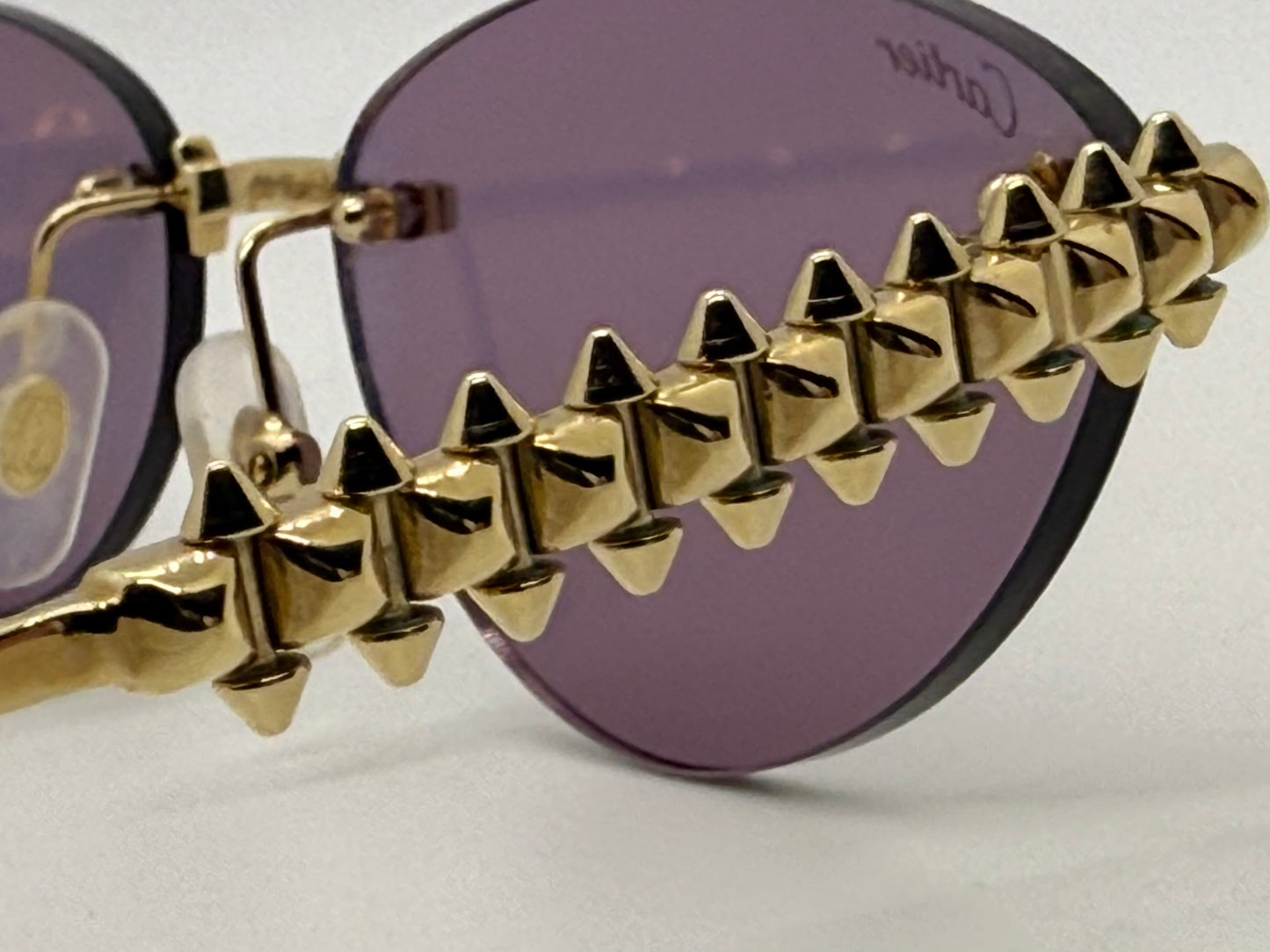 Cartier Clash de Cartier CT0543S 004 Gold Rimless Sunglasses-ZEISS Purple Lenses