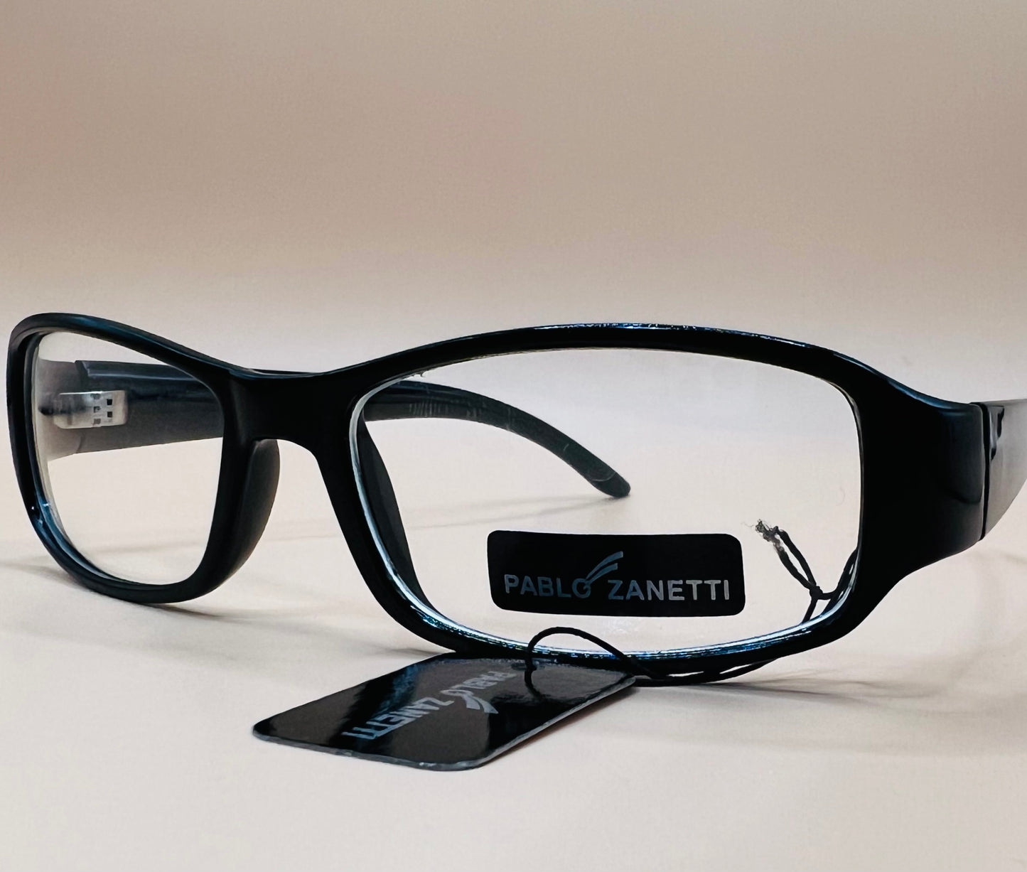 Pablo Zanetti rectangle frames.  Clear lenses, no magnification.   AFFORDABLE option to expense frames!