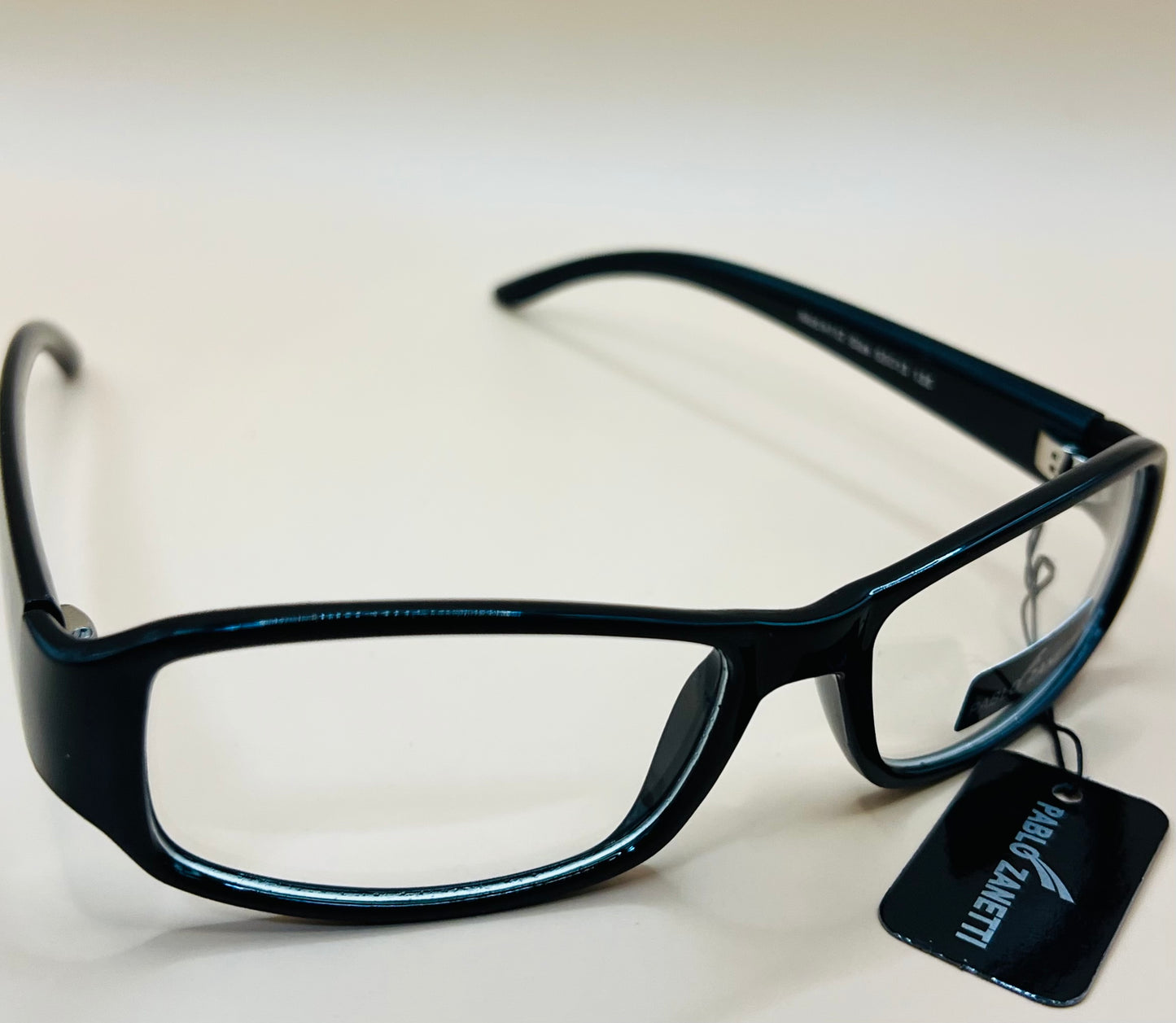 Pablo Zanetti rectangle frames.  Clear lenses, no magnification.   AFFORDABLE option to expense frames!