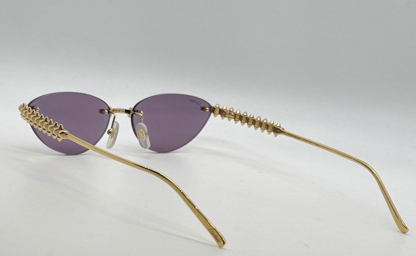 Cartier Clash de Cartier CT0543S 004 Gold Rimless Sunglasses-ZEISS Purple Lenses