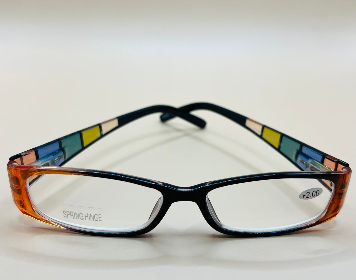 GEOMETRIC NARROW READERS.  BLACK FRAME FRONT WITH MULTI-COLOR ARMS