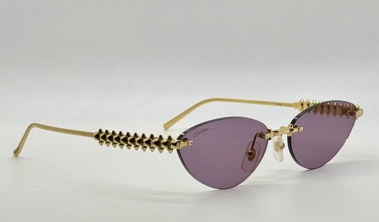 Cartier Clash de Cartier CT0543S 004 Gold Rimless Sunglasses-ZEISS Purple Lenses