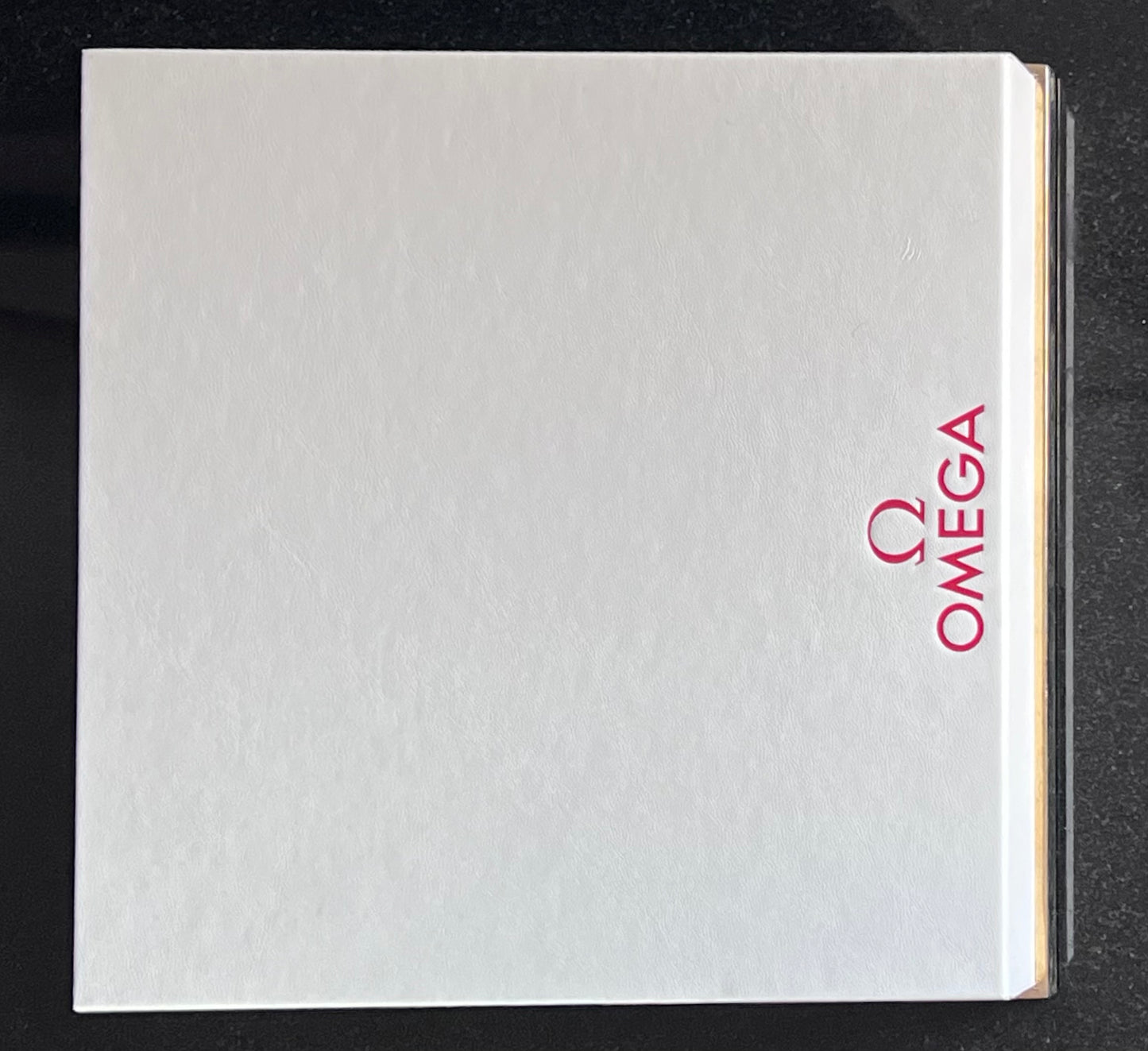 Omega Retail Display-Gold Base-White Leather-Embossed Iconic Red Omega Logo-MINT