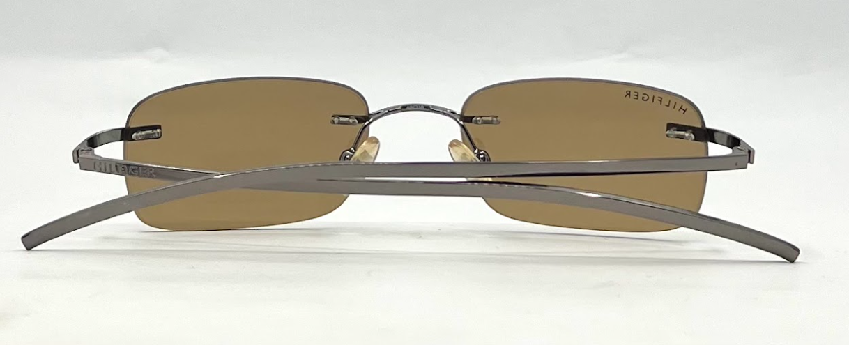 TOMMY HILFIGER TH 7007 Rimless Sunglasses–GUN Frame–Solid Brown Lenses–Unworn