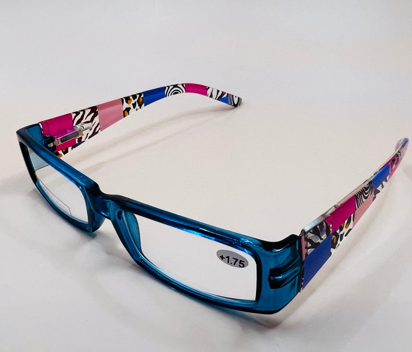 Sleek and stylish geometric narrow readers.  Featuring spring hinges in four colors with stylish arms and ultra thin Aspheric Lenses