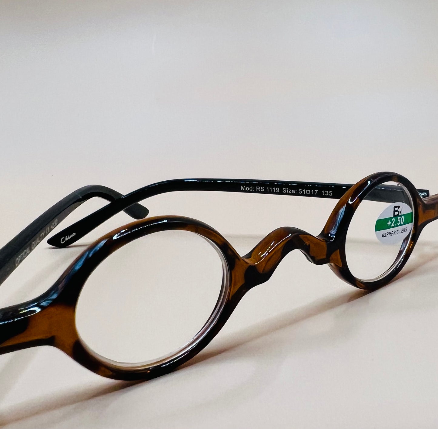 SMALL ROUND READERS.  BRAND NEW AND COME IN VARIOUS TORTOISE SHELL COLORS AND MAGNIFICATIONS