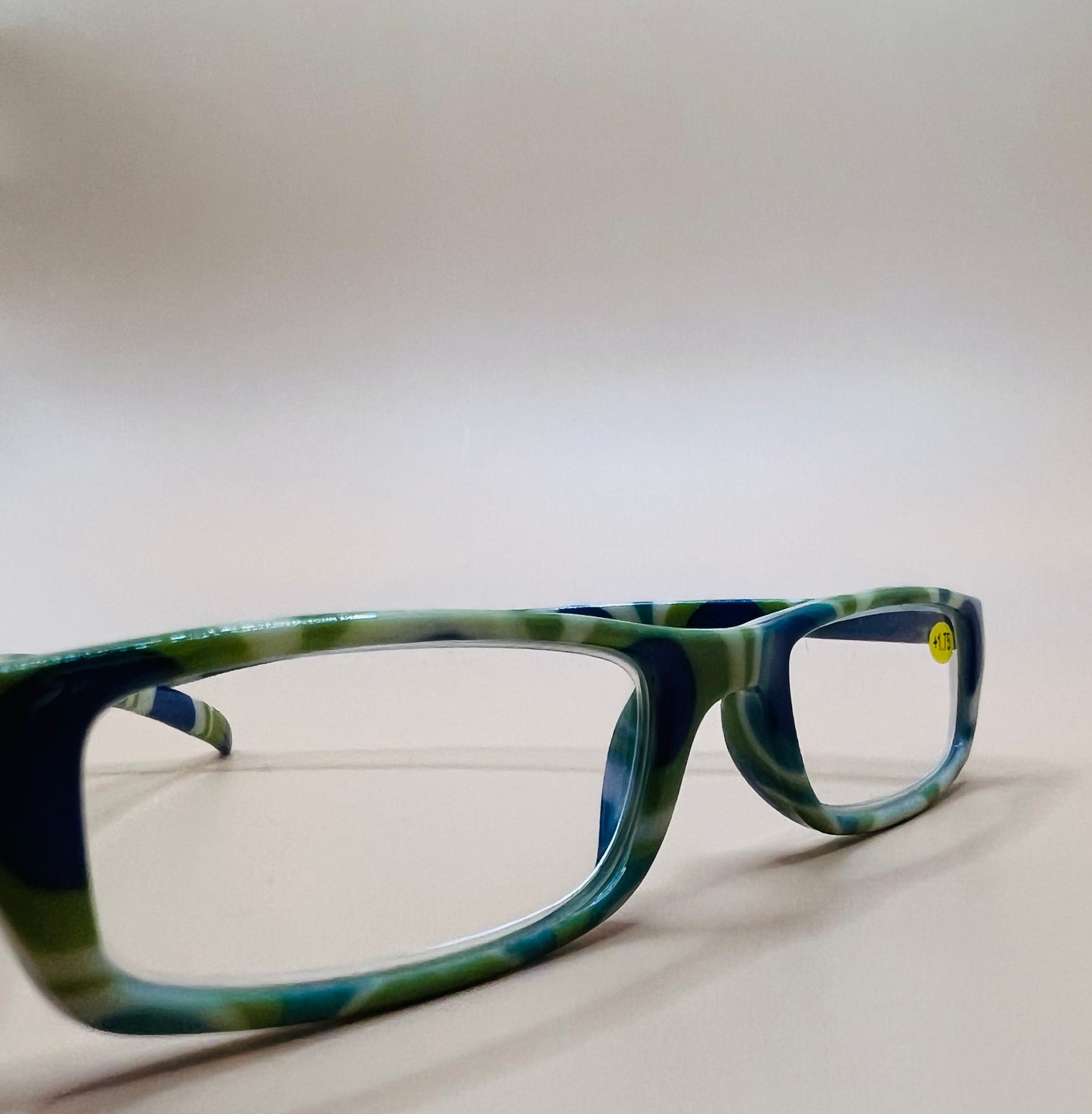 BRAND NEW GEOMETRIC NARROW READERS.  FEATURING A BLUE/GREEN MULTI-COLOR DESIGN WITH MATCHING CASE