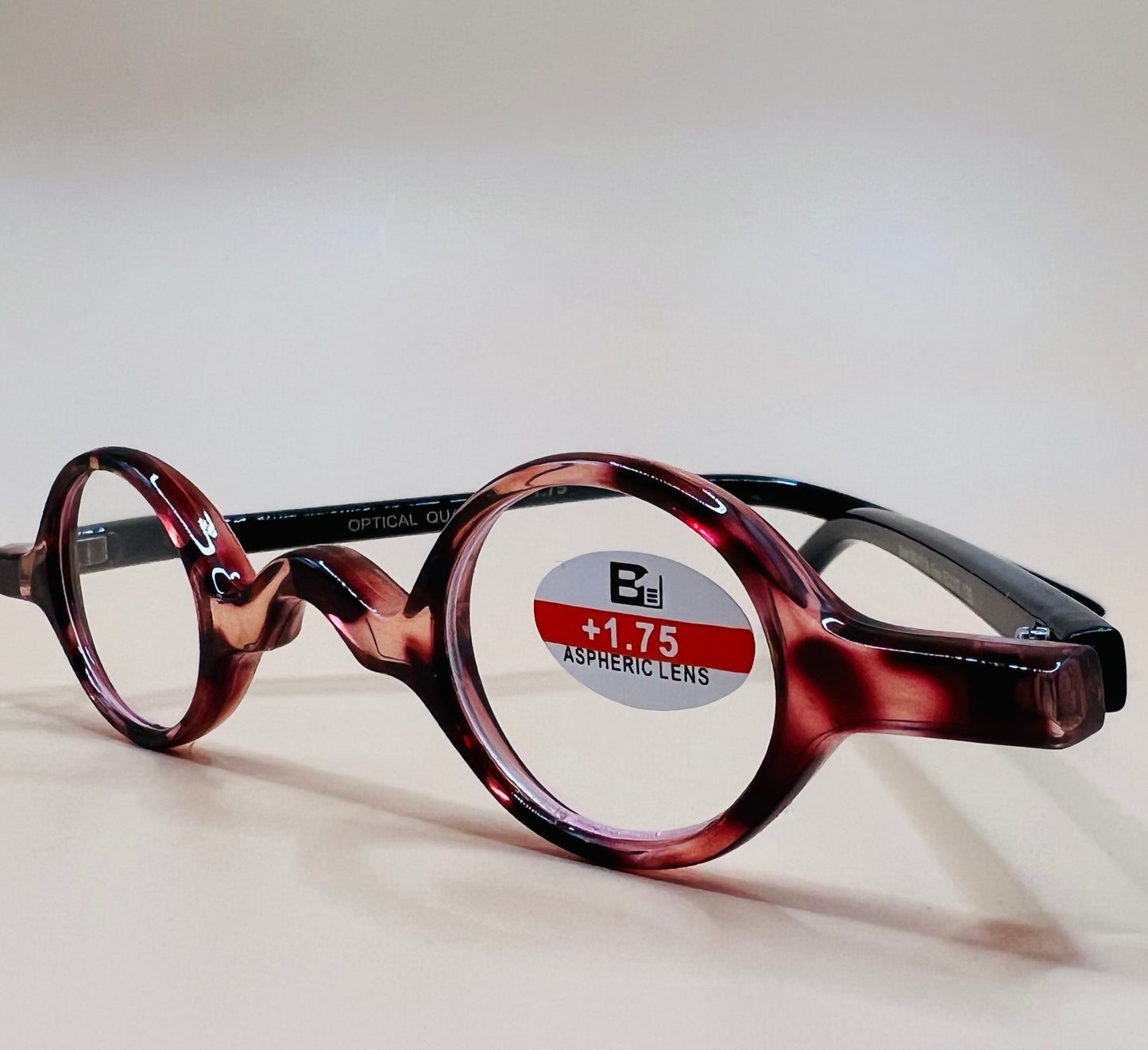 SMALL ROUND READERS.  BRAND NEW AND COME IN VARIOUS TORTOISE SHELL COLORS AND MAGNIFICATIONS