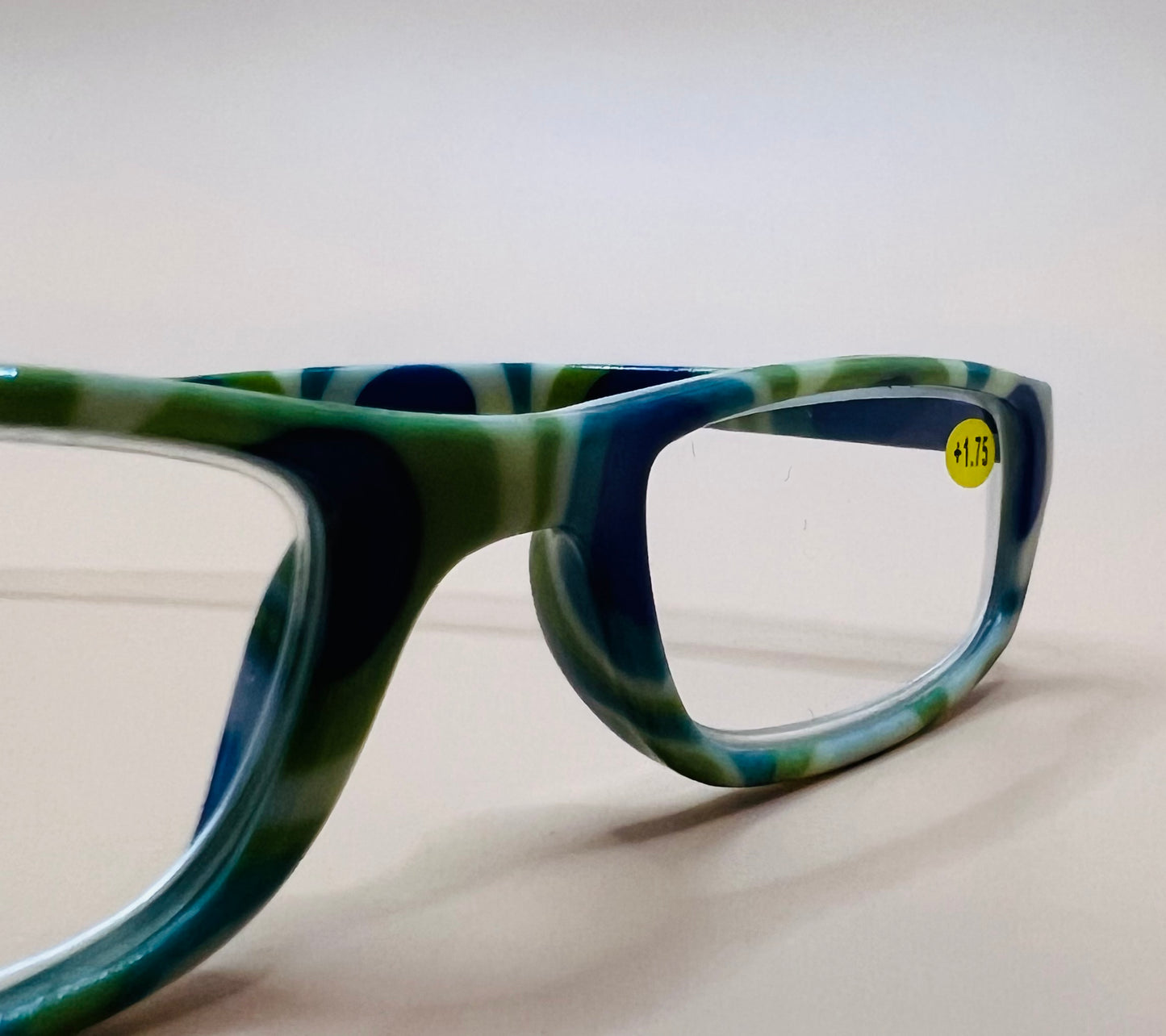 BRAND NEW GEOMETRIC NARROW READERS.  FEATURING A BLUE/GREEN MULTI-COLOR DESIGN WITH MATCHING CASE