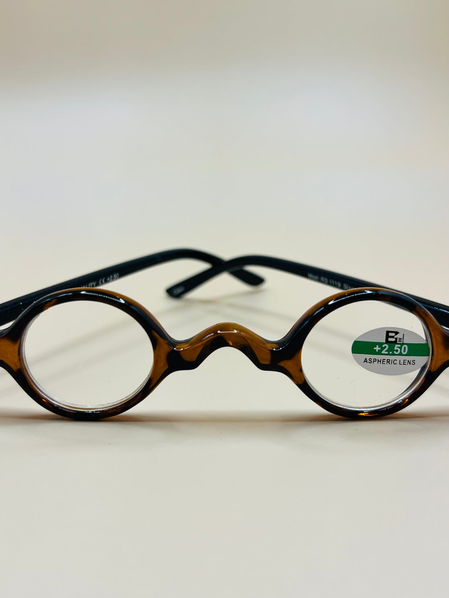 SMALL ROUND READERS.  BRAND NEW AND COME IN VARIOUS TORTOISE SHELL COLORS AND MAGNIFICATIONS